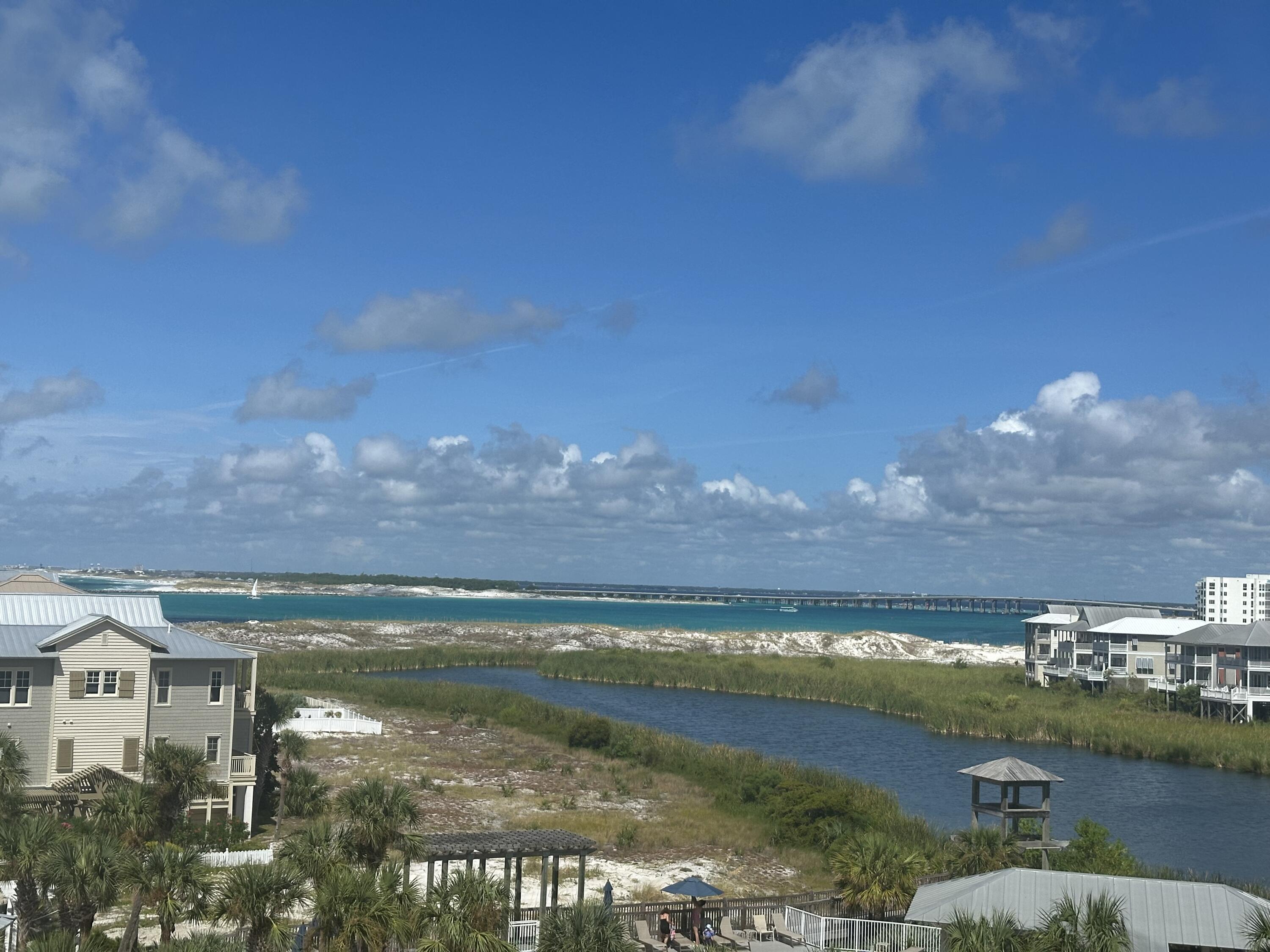 Unit 408B is 2BR, 2 BA with views of the Gulf, East Pass, Fort Walton and toward Crab Island. Heavily used by the owners. The unit has the possibility of grossing $45,000 plus. April 2024 fresh paint kitchen and living room, New stainless-steel appliances, new living room furniture and area rug, The kitchen features a step up countertop with extra cabinets for storage. New AC September 2024. The master bath has a single sink with the counter space to install a 2nd sink. The unit features EFCO (category4) sliding glass doors and windows paid by the seller. (approx. $30,000 value) Milestone Study and Structural Reserve Study have been completed. Begin and end each day enjoying spectacular morning views of the fishing boats in the East Pass, Gulf of Mexico and the most breathtaking evening sunsets, seasonal fireworks. Jetty East is a popular beach front condominium on Holiday Isle in Destin where you can easily stroll to the jetty to watch the boats, snorkel, or fish. Great location to shopping, grocery store and restaurants. Jetty East Amenities: 2400 sq. ft. covered parking, pool with sun deck, hot tub, beach side pavilion with charcoal grills, tennis courts, pickleball, fitness room, kid's activities, music entertainment, shuffleboard, owners meeting room and of course 900 feet of Sugar White Sand! Jetty East is gated with 24 Hour Security. Financing Note: Jetty is a Non-warrantable/ Condotel. No conventional financing.
