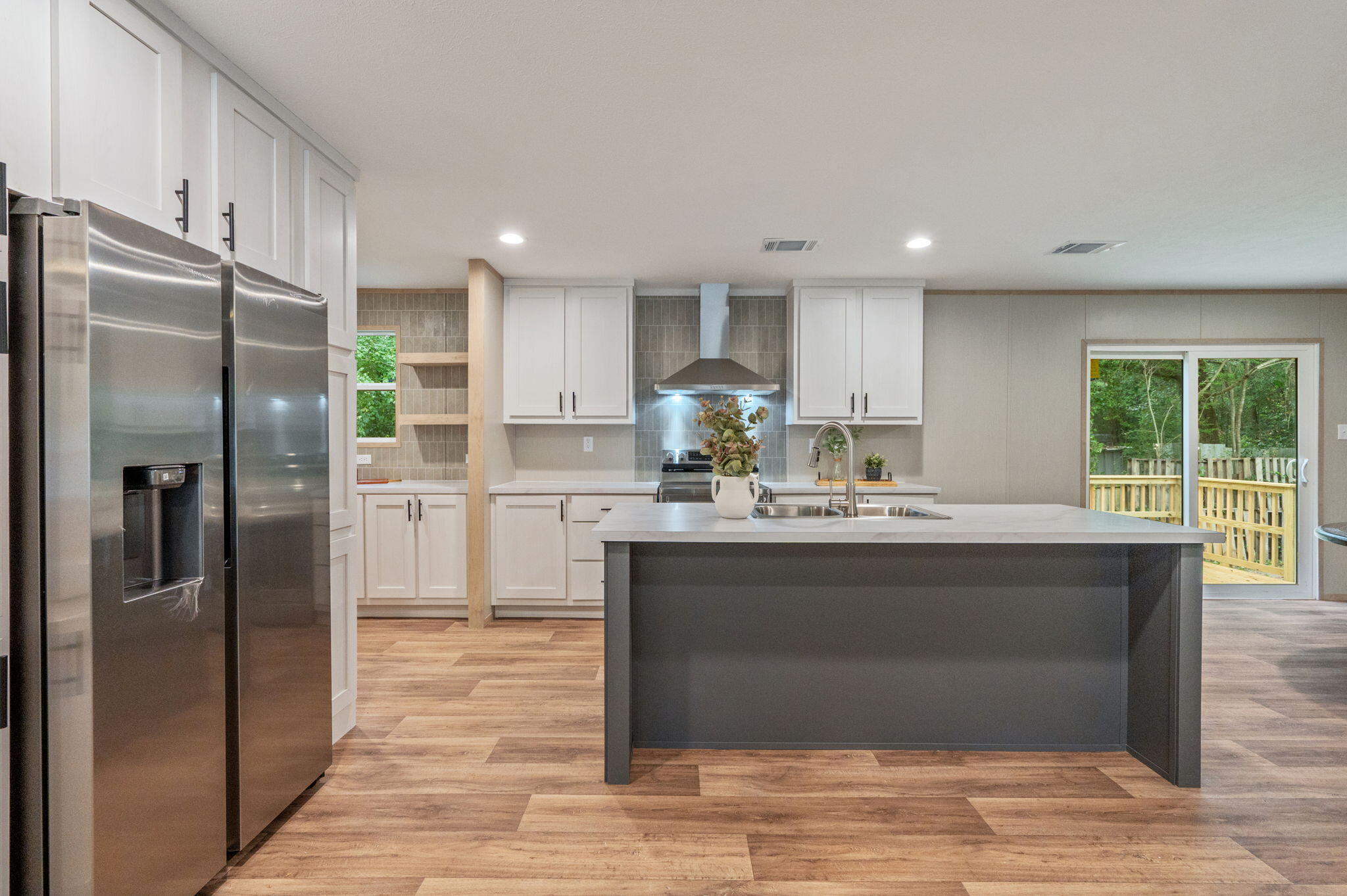 Brand New 2025 Manufactured Home. This home has a GORGEOUS Kitchen, Stainless Steel Range Hood, Refrigerator and Dishwasher, Island with Breakfast Bar. Huge Laundry Room and Pantry, Walk in Shower, Walk in Closets, Accents Walls. Fantastic split floor plan with Master Bedroom on one side, and 3 additional bedrooms on the other end of the home.