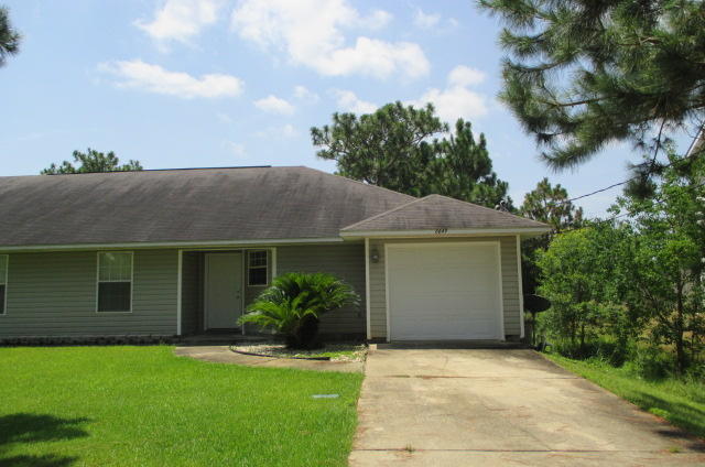 Spacious 3 bedroom 2 bath home-split floor plan in the front of Holley By The Sea. Excellent condition, high ceilings, plant ledges, breakfast bar and neutral colors throughout. Sliding glass door leads to fully fenced yard. Usage of RECREATION CENTER with Pools, workout room, tennis and many other amenities.