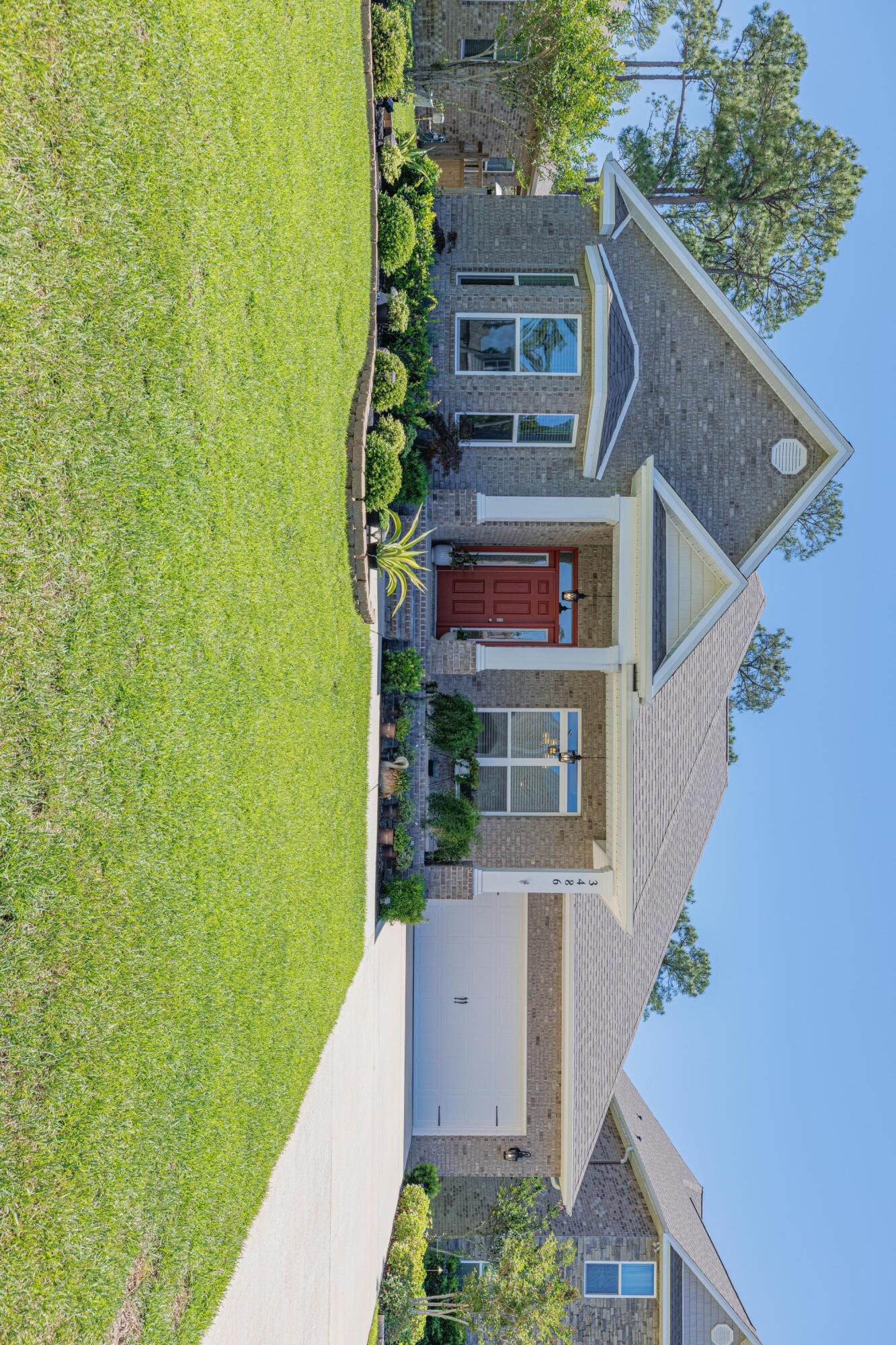 This 2019 5 bedroom 3 bathroom waterfront home is an outdoorsman's paradise! Situated on a double lot totaling .79 acres, this beautifully crafted 3127 sq ft retreat in Navarre is close enough to be convenient to shopping (10-15 min to Navarre shopping), recreation (15 min to Navarre Beach), and work (20 min to Hurlbert Field) while still offering access to nature via the property's dock on Poplar Creek leading to East Bay. Enjoy unparalleled views and sunsets, fishing, and water sports right off your backyard! Inside the home boasts an open concept plan, including a split floor plan lending privacy to the bedrooms. Other amenities include:Kitchen islandSolar tubes for natural light in the kitchenGranite countertopsStainless steel appliancesSpacious master closet conve