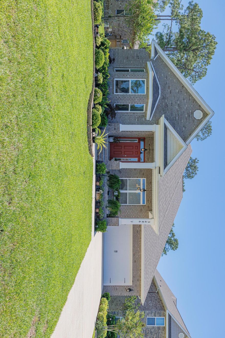 This 2019 5 bedroom 3 bathroom waterfront home is an outdoorsman's paradise! Situated on a double lot totaling .79 acres, this beautifully crafted 3127 sq ft retreat in Navarre is close enough to be convenient to shopping (10-15 min to Navarre shopping), recreation (15 min to Navarre Beach), and work (20 min to Hurlbert Field) while still offering access to nature via the property's dock on Poplar Creek leading to East Bay. Enjoy unparalleled views and sunsets, fishing, and water sports right off your backyard! Inside the home boasts an open concept plan, including a split floor plan lending privacy to the bedrooms. Other amenities include:Kitchen islandSolar tubes for natural light in the kitchenGranite countertopsStainless steel appliancesSpacious master closet conve