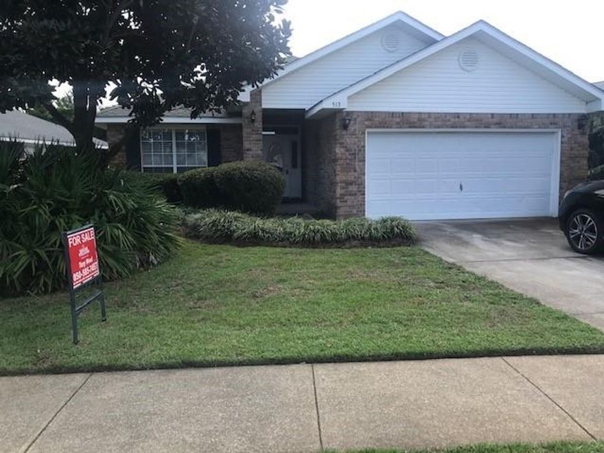 Stroll to your deeded, private beach access, from your home that is just  the second one inside the gated community right off Scenic Gulf Drive. This four bedroom, two bath home would make an ideal full- time home for beach lovers or vacation home/rental investment property. The home features an open floor plan with updated wood flooring in the living areas.  Covered patio and backyard that backs up to a wooded preserve behind the house.