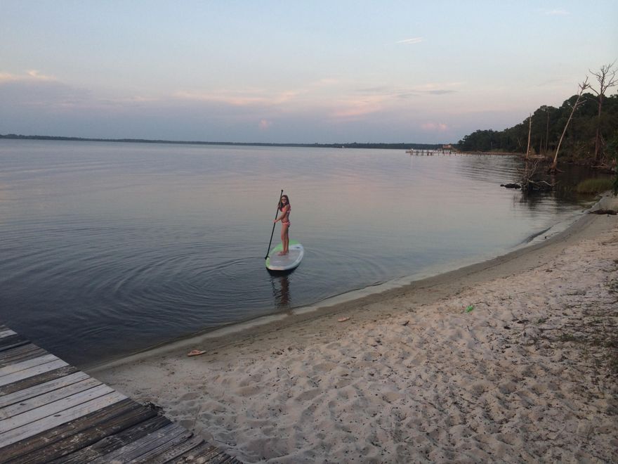 Bay Magnolia is a Nature Lover's paradise with only 44 homesites, underground utilities and Lots of trees to preserve the ''Old Florida'' look and feel. Grayton Beach, Seaside and Watercolor are only about a 5 minute drive to the South to Hwy 30-A. This large lot allows for a main house and a separate carriage house, in the style of design called Florida Cottage style. The Point Washington State Forest is located across E. Pt. Washington and is approximately 20,000 of managed forest. Wildlife is everywhere over here. This private community comes with it's own white sand beach, gazebo and community dock. This property has 193 feet on McQuage Bayou to build your personal dock. Fabulous view's over the bayou and bay. No build out time frame. Water Tap credit is paid.