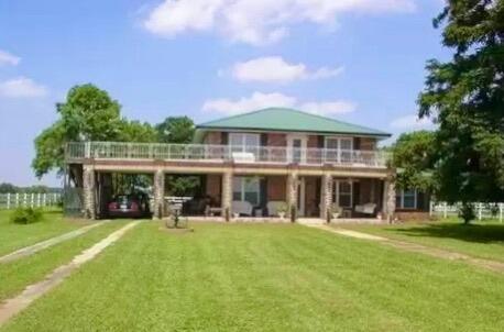 ENTERED FOR COMP PURPOSES ONLY! Country Living w/ 10 acres in this brick home The house was remodeled in 2007.  Original hardwood floors and high ceilings. Large wrap around porches. Master suite w/ wet bar downstairs and spacious bathroom.  Whirlpool tub, 2 person shower and large dual vanity.  Custom kitchen cabinets w/ center island open to a large sitting/dining area.  Large Den downstairs with wet bar. Upstairs 3 large bedrooms, large bath w/ large dual vanity. Sitting room and  a game room upstairs.  3 stall horse barn with feed/ tack room. An area around the home is fenced with white vinyl fencing and along the highway.