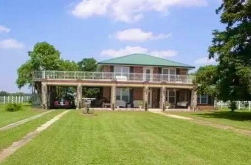 ENTERED FOR COMP PURPOSES ONLY! Country Living w/ 10 acres in this brick home The house was remodeled in 2007.  Original hardwood floors and high ceilings. Large wrap around porches. Master suite w/ wet bar downstairs and spacious bathroom.  Whirlpool tub, 2 person shower and large dual vanity.  Custom kitchen cabinets w/ center island open to a large sitting/dining area.  Large Den downstairs with wet bar. Upstairs 3 large bedrooms, large bath w/ large dual vanity. Sitting room and  a game room upstairs.  3 stall horse barn with feed/ tack room. An area around the home is fenced with white vinyl fencing and along the highway.