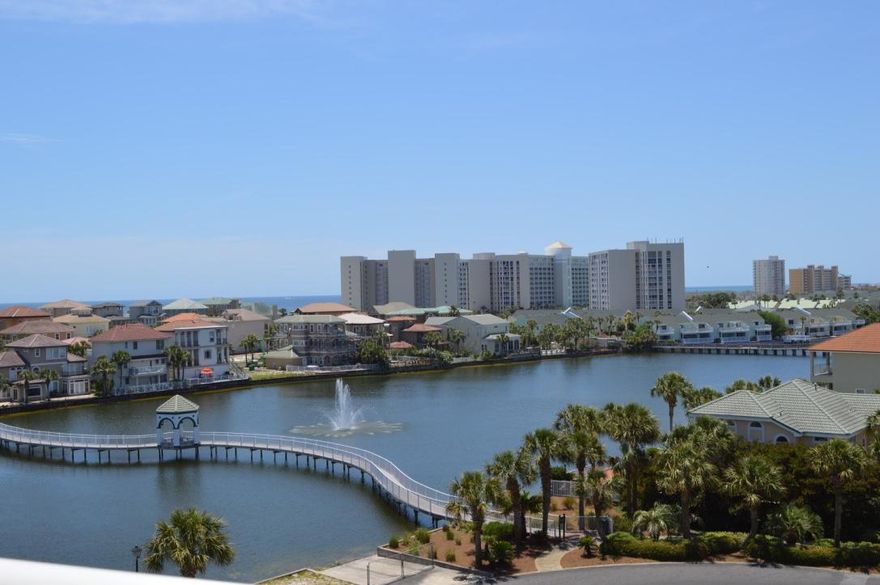 Located in the Terrace at Pelican Beach Resort in heart of Destin, this lake front unit is just a few steps to the beach. This 5th floor unit has great views of the pool area, the lake and panoramic views down the coastline. Completely turn-key, this 2-bedroom, 2-bath condo is rental ready. From the living room you can access the spacious balcony through floor-to-ceiling glass sliders, and the master flows out to the balcony. Pelican Beach Resorts is a perennial favorite for vacationers. The resort amenities include: conference center, large gulf-front pool, kiddie pool, indoor/outdoor heated pool, lakeside pool, beachside tiki hut, game room, Chan's Caf, lighted tennis courts, covered parking, fitness center, sauna, sun deck, and arcade. Convenient to activities & shopping.