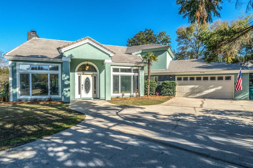 This Stunning, Luxury Class Parade of Homes Winner by Gary Miller is located on 126 ft of lake front (.48 acres - double lot) in Parkwood Estates. Fabulous views from almost every room in the house. Living and Dining Rooms open to a spacious family room and kitchen area. Custom kitchen with brazilian counter-tops and a breakfast room/office area with lake views. Master suite has walk out balcony, tray ceiling, huge walk-in shower, his/her vanities and walk-in closet. There's also a screened-in salt water pool with lake views. This home is complemented with vaulted and tray ceilings, travertine floors, over 600 SF of multi-level decking, custom mantel, beveled glass entry, 50 yr concrete tile roof, 6 panel doors and wood burning fireplace with gas starter. Cul-de-sac and gated community.