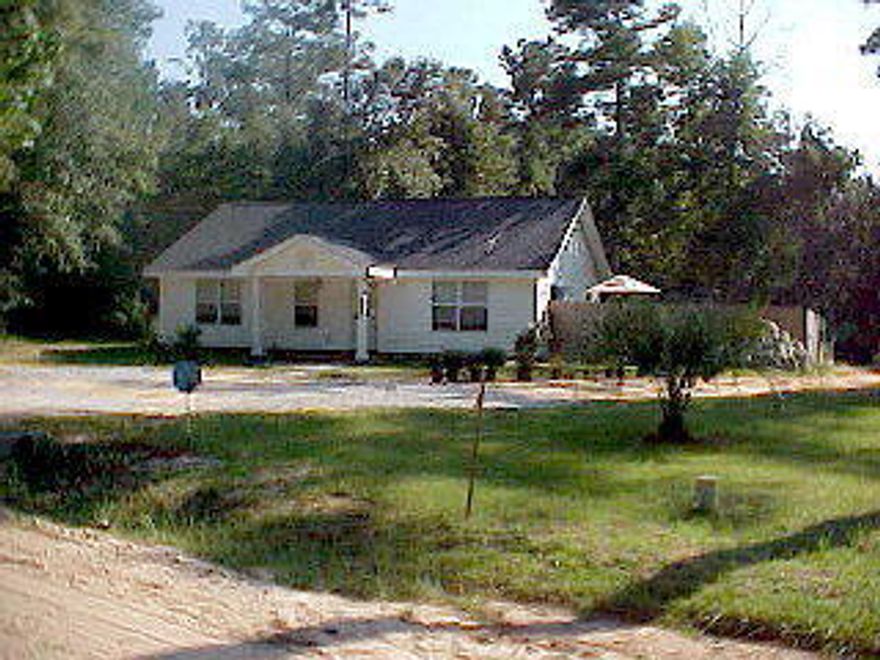 What a chance to own a great home near the beautiful Black Creek. Did I mention you are getting 2 lots with this purchase for a total of 1.3 acres!!!! This quaint home boasts solid oak cabinets with solid surface counter tops, crown molding, tile and pergo flooring. 20x12 workshop on the property for the craftsman. This is a great opportunity to own a solid 2x6 framed home just minutes from the creek and beaches, with plenty of property. Also comes with deeded access to the community dock on black creek to fish, park your boat or just relax!!!