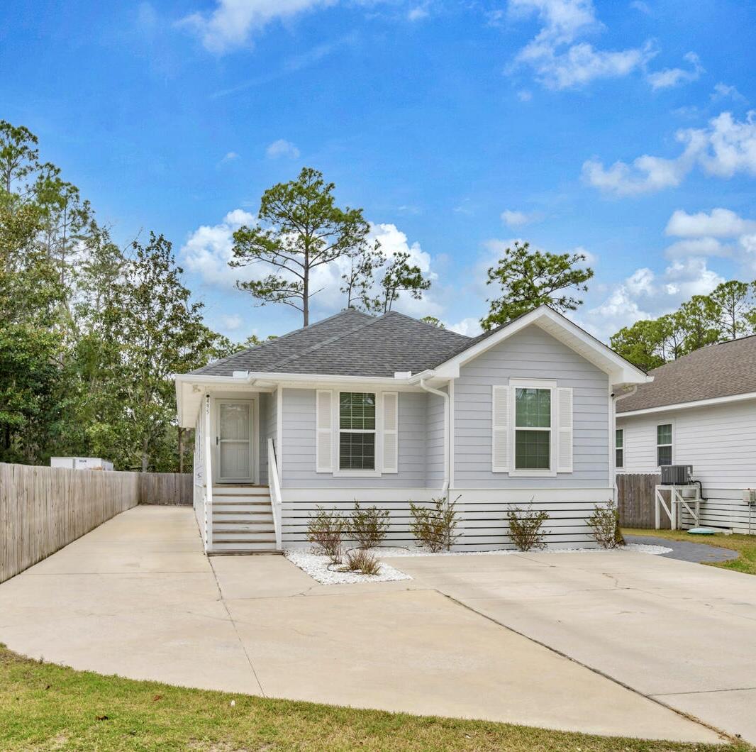 Located just minutes from beaches, shopping, dining, and outdoor recreation, this home offers both convenience and coastal charm. Whether you're looking for a full-time residence, vacation getaway, or investment property, this updated Santa Rosa Beach home is a must-see!Upgrades include electric fireplace with built-in TV for a cozy living space. Modern kitchen with tiled backsplash. Extended concrete driveway providing ample parking for trailers, RVs, golf carts & more. Fully paved backyard with underground electrical to the back of lot & storage shed for added convenience. Luxury vinyl plank flooring throughout (no carpet!) and master bathroom remodel featuring a custom tiled walk-in shower. Gutters & security lights added for extra functionality and peace of mind. 495 Indian Woman is a beautifully updated home offering both comfort and functionality in a prime location making it move-in ready and perfect for enjoying the Florida lifestyle.