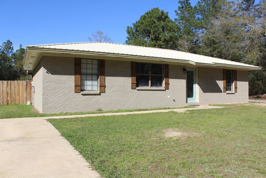 Cozy brick three-bedroom ranch style home on over an acre conveniently located just outside of city limits! This would make the perfect starter home or home to downsize to. There is absolutely zero wasted space. Open floor plan with split bedrooms makes living in this home convenient. The roof is only a year old and the exterior is freshly painted! The outside features a fenced back yard, a covered deck, an above ground pool and a huge workshop! Make your appointment to see this home today!