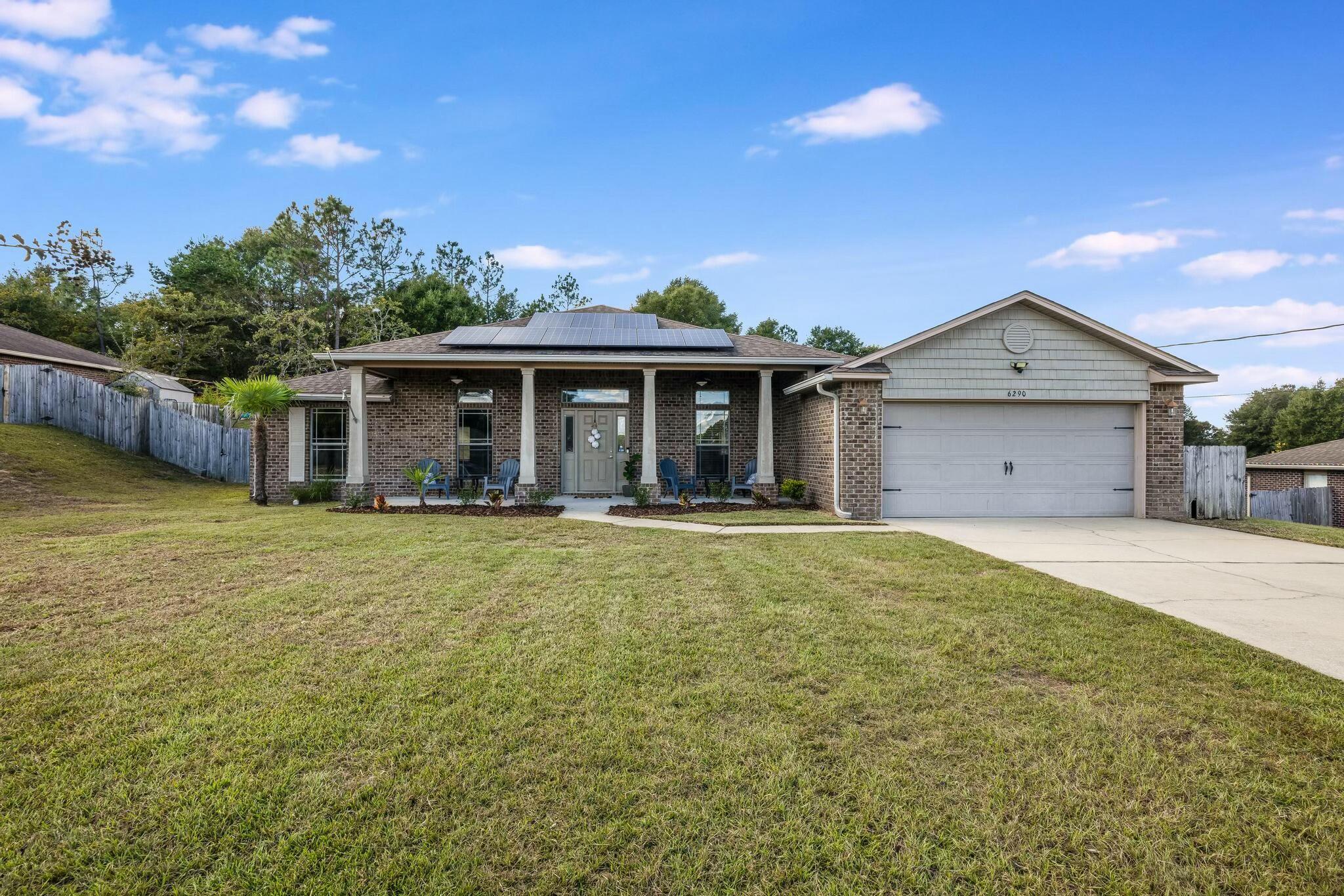 Welcome to this spacious 4-bedroom, 2-bathroom brick home, freshly painted and ready for new owners to add their unique style and personality. This residence offers a fantastic open floor plan designed for both comfort and entertaining. The kitchen is a chef's dream, featuring granite countertops, ample cabinetry, a large raised bar, and a spacious island that seamlessly flows into the family room - perfect for gatherings and casual dining. For more formal occasions, enjoy meals in the dining room.Retreat to the spacious bedrooms, including a luxurious master suite complete with a double vanity, walk-in closet, separate shower, and a relaxing garden tub. Step outside to the screened-in porch, ideal for enjoying Florida's sunny days, overlooking a large fenced backyard on a generous 0.62 Experience true energy efficiency with the whole-home solar system, reducing energy costs and promoting sustainability. Need extra space for hobbies or storage? This property includes an insulated galvanized steel powered workshop and additional parking in the extra garage.

This home offers an abundance of space and amenities, capturing the essence of the perfect Florida lifestyle. Ready to make it your own? Schedule your showing today and envision the possibilities!







