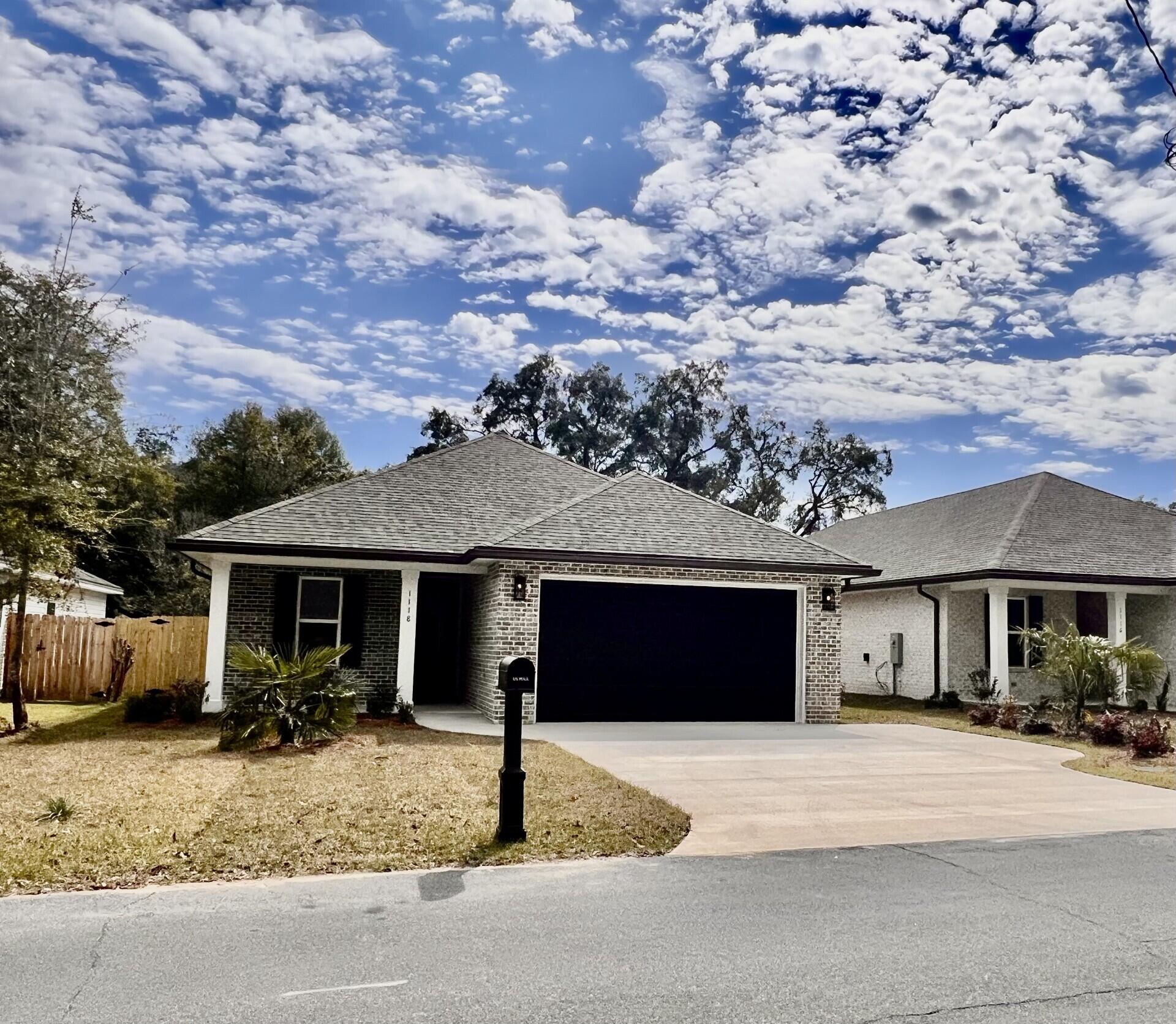 Have you been Asking for a Blessing? THIS IS IT! COME MAKE THIS BEAUTIFUL NEW CONSTRUCTION YOUR HOME. A new home is all about location and with the UP and COMING neighborhood, you don't want to miss this amazing deal!! The builder pays doc stamps, final survey, title and all title related fees. The builder is 'Buyer agent friendly.' This 4bdrm, 3bth, all brick home has been designed perfectly for family, pets and entertaining. You'll love the 9ft ceilings with a custom tray in the family room and master. Custom crown molding in all the main areas and master suite. This open concept kitchen, family/living and dining boast custom design.In the evenings you can enjoy the kitchen cabinet undermount lightning for movie night or a nice romantic evening and you will absolutely love the custom designed tile shower with rainhead, 2nd sprayer and bench. Bath no.3 if a custom tile shower with a shampoo cubby. Don't forget, the builder installed high impact windows, upgraded to spray foam insulation in the roof and placed some decking in the attic for extra storage. The family will really enjoy the level back yard and privacy fence. The sprinkler system, and professional landscaping make maintenance a breeze and a perfect place for children and pets to play. Utilities are all underground.