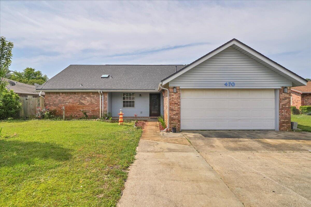 New Paint. Roof, HVAC, Water Heater all under 4 years old. Located behind Santa Rosa Mall. Easy drive to Hurlburt. Oversized Living room with high vaulted ceilings and wood burning Fireplace. All new vinyl flooring throughout. This adorable 3 bd/ 2 ba second story (1.5 story)home is equipped with an office and an upstairs bonus/ possible bedroom. Workshop in back yard has tons of potential as a mother in law suite.