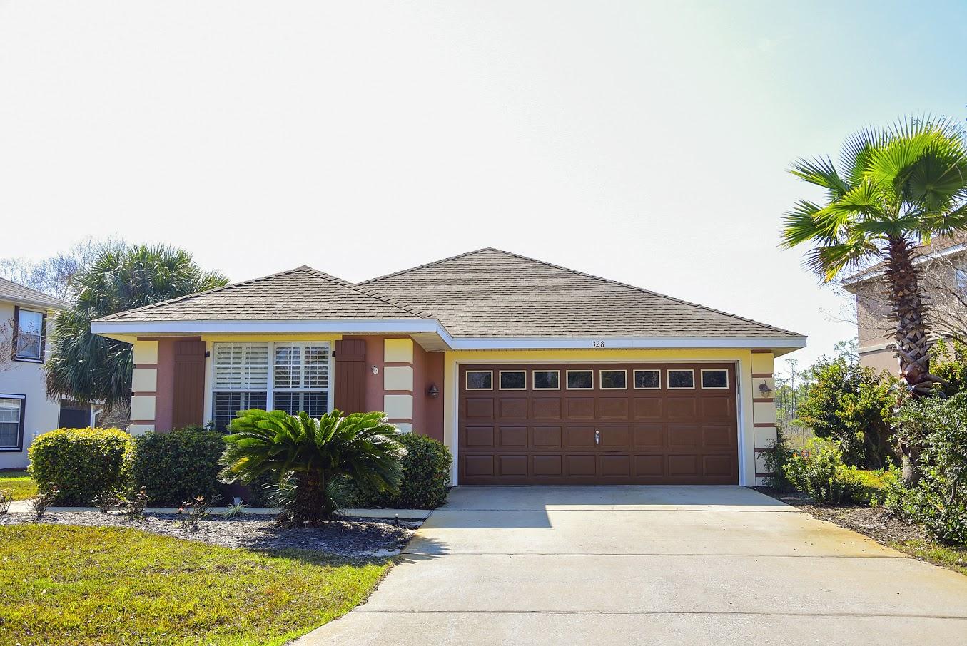 PRICE REDUCTION! Beautifully maintained MOVE-IN READY home located in gated community of EMERALD LAKES with community pool and tennis courts. Home features brand new stained concrete flooring throughout, plantation shutters, electric fireplace, screened porch overlooking the lake, and a separate screened area equipped with a hot tub. Master suite features walk-in closet, double sinks, separate shower and garden tub. The master also has a view of the lake. Spacious kitchen has lots of cabinets and counter space, walk-in pantry, and breakfast bar. Termite bond in place. Property located in flood zone ''X'', no flood insurance required.Emerald Lakes is conveniently located close to shopping, restaurants, and only 1/4 mile to beautiful beaches of Destin!