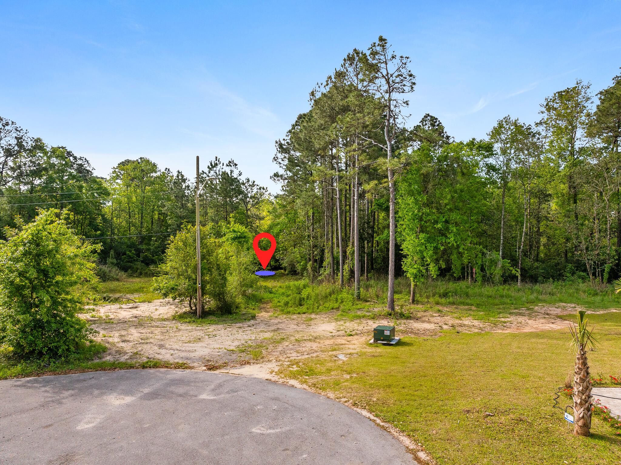 Situated on a quiet, private dead-end road, this one-acre homesite offers the perfect blend of seclusion and convenience. Zoned for residential single-family use, the property presents a great opportunity to build a custom home in a peaceful, natural setting.The back half of the lot is considered wetlands, leaving over half an acre of buildable space at the front--ideal for your future homesite. A recent survey has already been completed, and a beautifully engineered floor plan package--valued at $10,000--is available to interested buyers. The thoughtfully designed plans can help streamline the building process. With no HOA, you'll have the flexibility to build without added restrictions. Conveniently located just minutes from the interstate, the property offers easy access to local shopping, dining, and essential amenities.
This lot is a rare find for those seeking a private retreat with nearby city access.