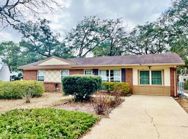 Incredible opportunity to own this very special, one owner home in charming Valparaiso, just minutes to the water front park and Eglin AFB. This warm and welcoming 3 bedroom 2 bath home has versatile living spaces, complete with a living room, large family room and bonus room that can easily be a 4th bedroom or office with addition of a door. The kitchen is spacious with plenty of cabinets, smooth top stove and breakfast bar. Enjoy the screened in porch and fenced in backyard on quarter of an acre, with a 12x8 shed for lawn equipment, bicycles, etc. The camelia tree in the center of the yard is a delight in winter, bursting with beautiful red flowers. There's so much to love here. Make plans to tour this home today. An Estate Sale will be on going until all furniture and items are gone.
