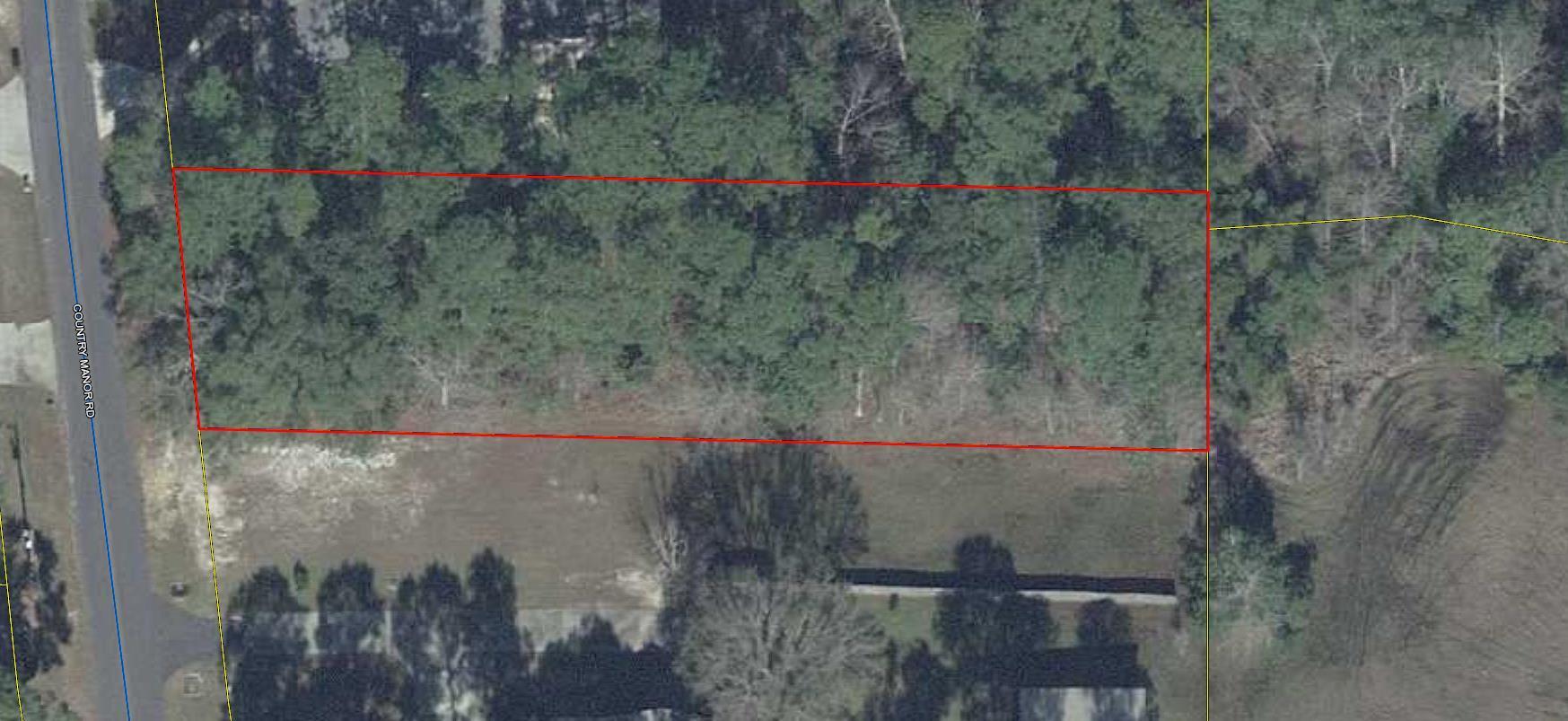 Beautiful wooded building lot on paved road. Property is located in the county, yet you feel you are in the city....This is a restricted unrecorded subdivision with beautiful homes.