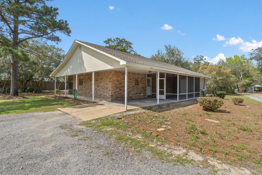 Charming 2-Bedroom Retreat by the Bay and Boat Ramp**X Flood Zone* Escape the everyday hustle and immerse yourself in nature at this tranquil 2-bedroom, 2-bathroom home nestled on a serene 0.37-acre lot. Located just two blocks from the Bay and a short walk from the boat ramp (0.4 Miles), this peaceful retreat offers the perfect blend of convenience and relaxation. With shopping, restaurants, and Pensacola Beach only 9 miles away, you'll enjoy the best of both worlds. **Property Highlights:** *Split-Master Layout**: Two generously sized bedrooms, each featuring a full bath, large walk-in closets, and French doors that lead out to your private back screened-in porch. *Indoor/Outdoor Living**: The open-concept kitchen and living space flow seamlessly into both front and back screened-in porchesperfect for enjoying quiet mornings or evening sunsets. Tinker on your toys in the mini workshop, located inside the carport. *Modern Amenities**: This home is equipped with a washer, dryer, and refrigerator, along with updated hardware throughout for a contemporary feel. *Outdoor Potential**: The expansive yard provides plenty of space for a pool, garden, or any outdoor activities you desire. *RV & Boat Ready**: A 30-amp RV plug and no HOA restrictions make this property ideal for RV or boat owners. Plus, a nearby boat ramp makes it easy to take advantage of the Bay & Sound waterways. *Prime Location**: Situated in a desirable school district, with nearby shopping and dining options, this home is perfectly placed for convenience. Whether you're seeking a peaceful full-time residence, a weekend getaway, or an investment property like an Airbnb or fishing camp, this home offers endless possibilities. Experience the perfect balance of modern comfort and natural tranquility today! All Major systems have been replaced: Roof 2021, HVAC 2014 & 2019, 2022 appliances! Let's not forget the affordable utilities.
