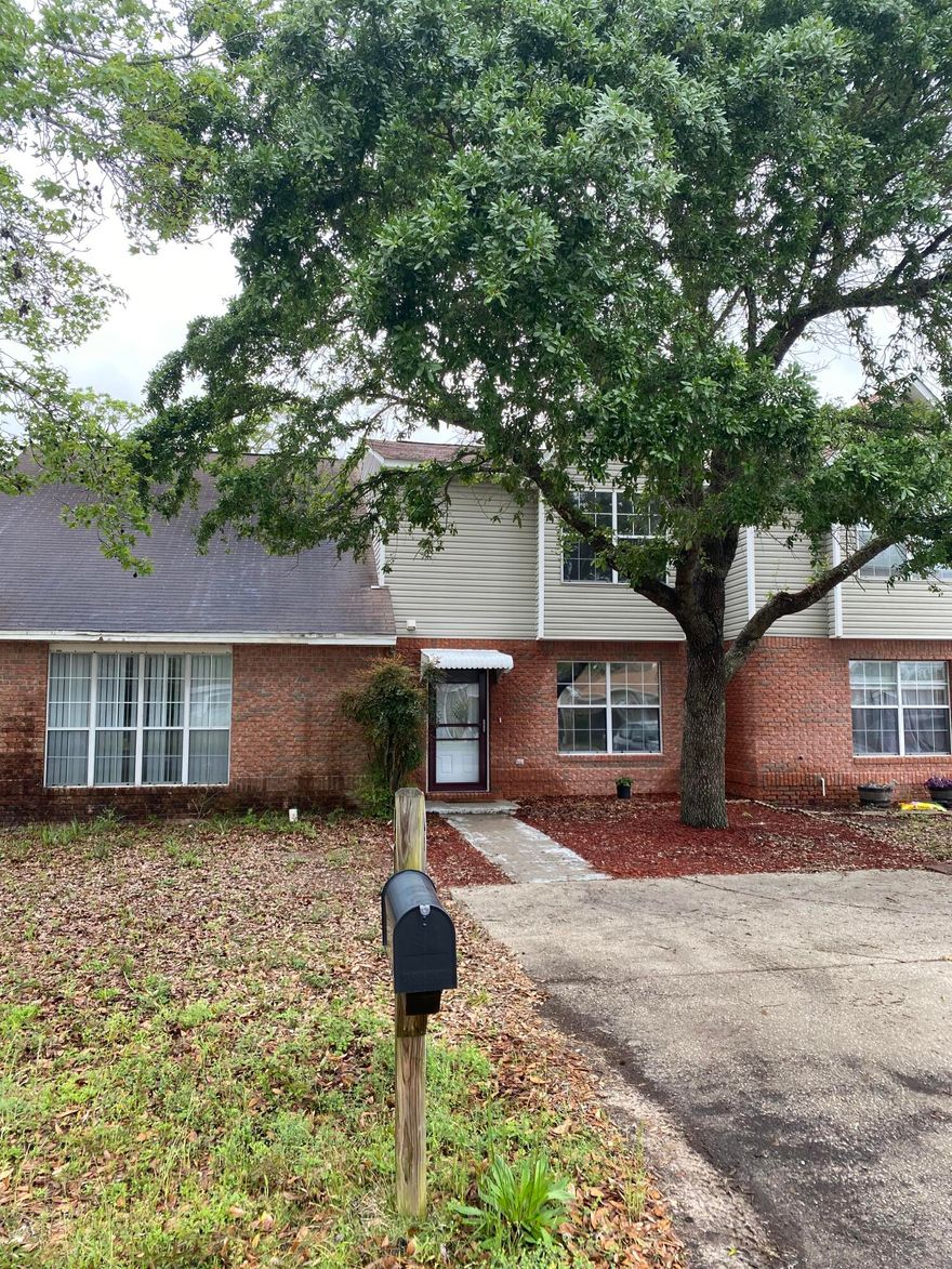 Perfectly located townhome west of Hurlburt, Easy access to beaches, shopping, restaurants, schools and more.  Completely Renovated 2 bedroom 1.5 bathrooms.  New paint throughout, New flooring including w/w carpet and laminate vinyl plank, New patio door, New to code electrical panel and newer water heater and HVAC.  Kitchens and baths also renovated with new stone and appliances. Back yard has an open patio and privacy fenced in yard. Washer and dryer convey as well as mounted TV's.  Whether for a personal residence or investment property this unit is ready for you.