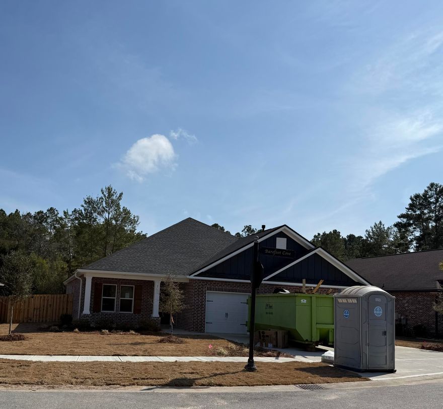 Builder will pay for Title, Documentary Taxes and final Survey. Custom, 5 bdr, 4 bath home. Features inc. an open concept great room, dining and kitchen, all overlooking the backyard and nature preserve. Spacious MBDR and bath w/a walk in shower and separate soaking tub. Laundry w/sink. A 3 car garage-w/ attic access for storage, 10' ceilings, w/12' ceiling in great room and mbdr. Custom soft close cabinetry w/Quartz countertops, 7' crown molding, tile and LVP flooring (no carpet) tankless water heater, ceiling fans, window blinds and more! Professionally landscaped w/sprinkler system and well. Gutters and a 6' high privacy fence w/gate already in place.  (Features List in the document section.) Enjoy the extensive array of amenities Hammock Bay has to offer. Room sizes to be verified.