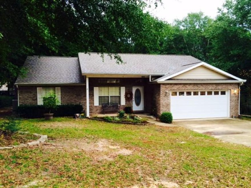 Enjoy country living in this all brick home located on a low traffic street in North Crestview with lots of trees. Walk into a open floor plan with Living Room, a country Kitchen with a breakfast bar, tiled flooring in the entry, Kitchen, Dining area and both bathrooms, Split bedroom design. Cultured marble vanities in both bathrooms + a cultured marble whirlpool garden tub with tile surround & glass block window in the Master bathroom. Oversized Master bedroom has a walk-in closet. 2-Car attached garage, 20x15 deck and a 170 ft long additional driveway to a 16x20 Man Cave...detached workshop with power. Room enough for your RV or boat. The new A/C makes this home energy efficient. Pet considered. Don't wait, call today!