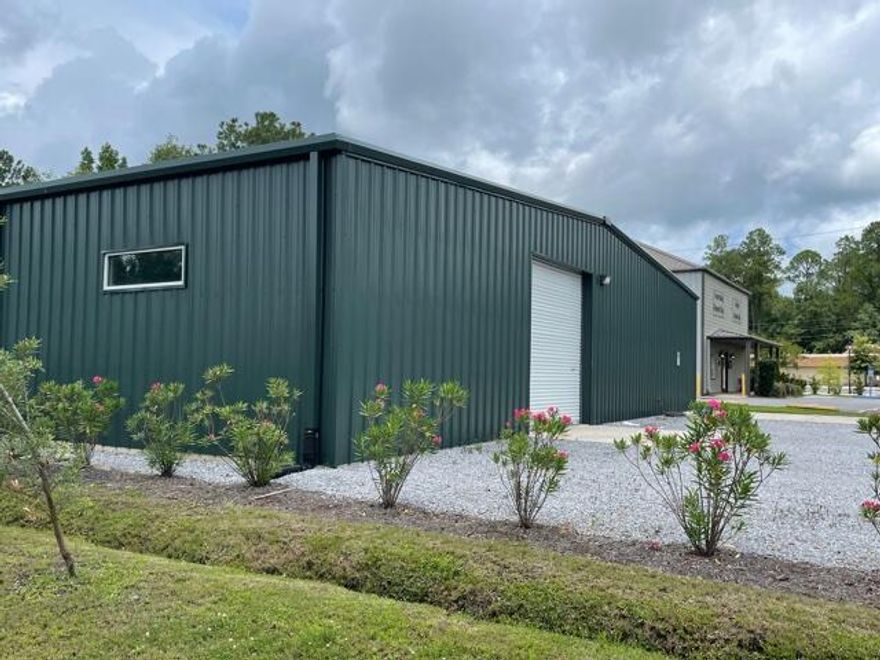 The subject property conveys a 7,000 sqft flex warehouse building conveniently located in Downtown Freeport, FL one block south of Highway 20. This building has roughly 1500 sqft of newly built office space, two full bathrooms, and 5500 sqft of warehouse with two 12'x12' roll-up doors on each end of the building allowing drive through ingress & egress with parking on each side of building.