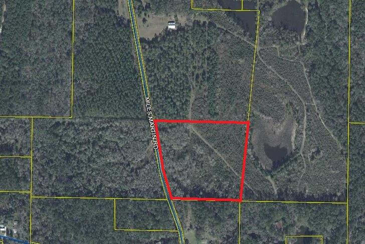 Nice wooded 10 acre tract located close to town off Bob Sikes Rd. Electricity is available along the road and the property will need a well and septic. Excellent location. Beautiful hardwoods. Additional acreage is available for purchase.