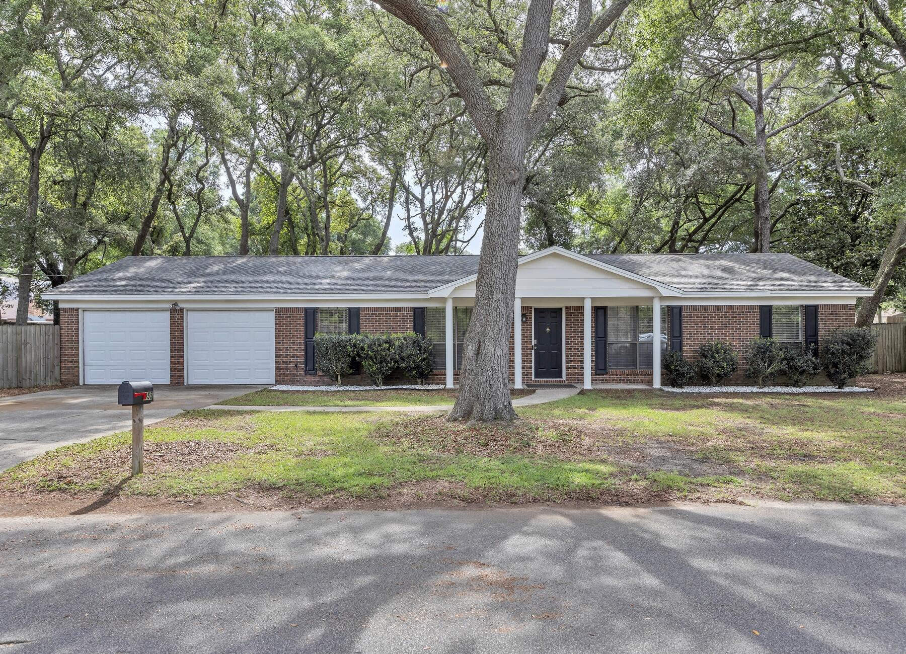 Beautiful brick home on a 1/3 acre lot in the heart of Fort Walton Beach. Enjoy low energy bills and privacy beneath the beautiful oak trees. The inside has been fully remodeled from top to bottom in modern and functional finishes to include new flooring, kitchen appliances, and more. The open plan of the living, dining, and kitchen make for a perfect entertaining space that leads right out into the spacious backyard. The kitchen is fully equipped with stainless steel appliances, granite counter tops, and new cabinetry. There is a bonus room at the front of the home with French doors that makes for an ideal office or play room. The three bedrooms are situated down the hall and both bathrooms were redone in 2019. All major systems were updated in 2019. Completely move in ready now!
