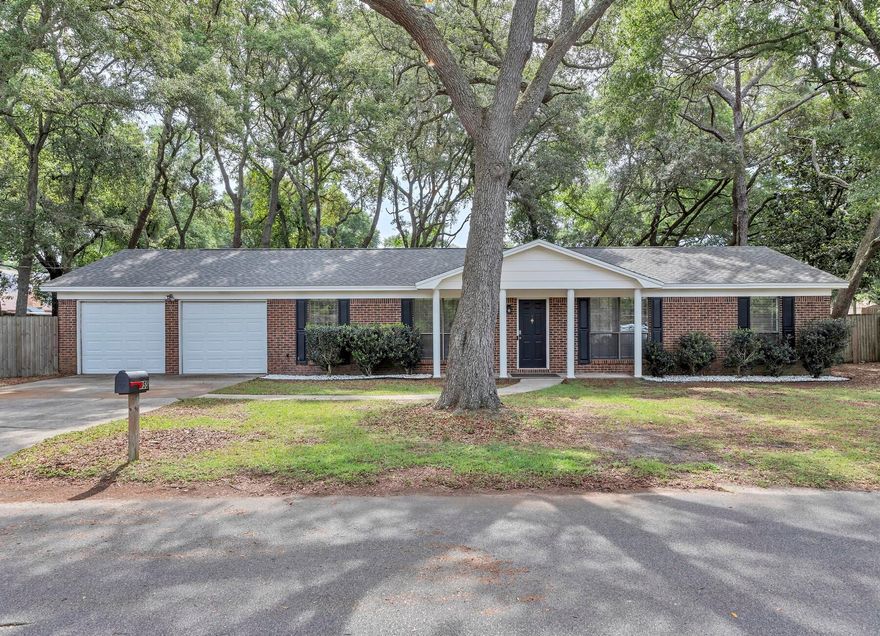 Beautiful brick home on a 1/3 acre lot in the heart of Fort Walton Beach. Enjoy low energy bills and privacy beneath the beautiful oak trees. The inside has been fully remodeled from top to bottom in modern and functional finishes to include new flooring, kitchen appliances, and more. The open plan of the living, dining, and kitchen make for a perfect entertaining space that leads right out into the spacious backyard. The kitchen is fully equipped with stainless steel appliances, granite counter tops, and new cabinetry. There is a bonus room at the front of the home with French doors that makes for an ideal office or play room. The three bedrooms are situated down the hall and both bathrooms were redone in 2019. All major systems were updated in 2019. Completely move in ready now!