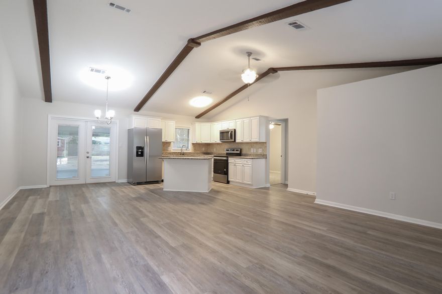 Home is getting a New Roof. 2022 HVAC, & Hot Water Heater.

 Hurry on down for this adorable remodeled 3 Bedroom 2 bath home.  Home ready for new owners.  Recent updates include new kitchen which  includes Stainless Steel Appliances, granite counter tops, lighting, and flooring. New interior paint, laminate hardwood flooring in living areas, and carpeting in bedrooms. All new lighting and ceiling fans, new bathroom vanities with granite countertops and mirrors.  Vaulted ceilings in kitchen and living area.