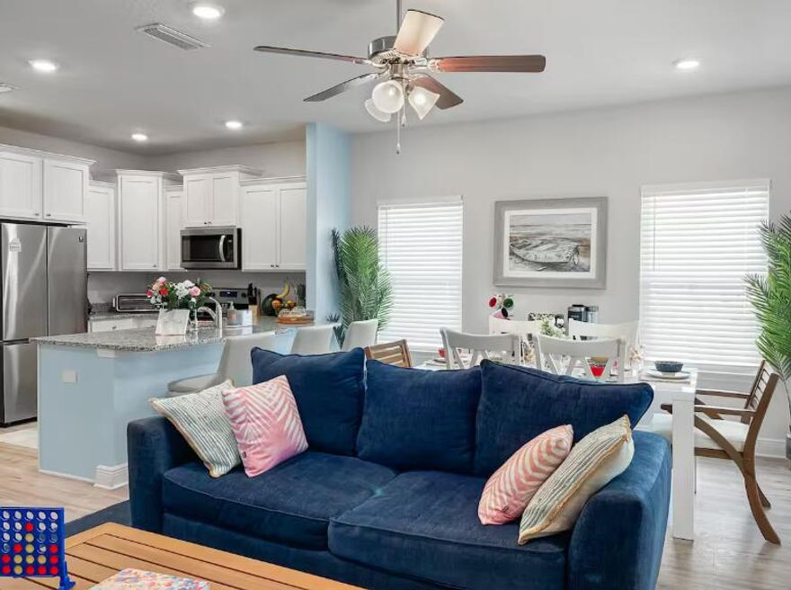 EV Charger, Retro Design, 5 Star airbnb.A one of a kind impactful getaway in the heart of Santa Rosa Beach, just a 5 minute drive to the beach! The interior design is truly immersive, with beautiful wall murals creating that one of a kind vibe! Positioned just north of 30A along the stunning Emerald Coast. Currently celebrated on Airbnb with five-star reviews, this short term or long term rental is a favorite among guests seeking unforgettable beach experiences.Prime Location & Accessibility:A mere 5-minute drive leads you to the breathtaking public beaches of 30A, where soft sands meet crystal clear waters. Enjoy vibrant dining and shopping options just 6 minutes away, convenient Silver Sands, Destin Commons, and Grand Boulevard in Sandestin. Golf enthusiasts will appreciate multiple courses, within a  7-minute ride away.

Explore the Best of Santa Rosa Beach:
Santa Rosa Beach is brimming with attractions for everyone. Experience local favorites:
- Baytowne Wharf: A lively waterfront village boasting fantastic restaurants, shops, and family-friendly events.
- Craft Breweries: Enjoy local brews at Grayson Beer Company and Idyll Hounds Brewing.
- Live Music: Join the fun at Kith + Lin for live performances every Monday evening at 6 PM.
- Seafood with a View: Delight in fresh seafood and stunning ocean vistas at Shunk Gulley Oyster Bar.
- Eclectic Dining: Savor a unique culinary experience at Louis Louis, filled with art and ambiance.
- Sports Bar Fun: Catch the game at Shades Sports Bar & Grille in a lively atmosphere.
- Shopping & Entertainment: Visit Grand Boulevard at Sandestin for exceptional shopping and dining options.
- Nature Lovers' Paradise: Explore the trails of Port Washington State Forest and the ancient dunes at Topsail Hill Nature Preserve.

This coastal town home allows you to revel in the tranquility of Sandy Pines while remaining close to the excitement of the 30A area. With everything at your fingertips, it's the perfect blend of relaxation and adventure.

This home comes standard with a Smart Home Technology package which includes a keyless entry, Skybell doorbell, automated front porch lighting, an Echo Dot device, and Quolsys touch panel which can be integrated to control your lighting, thermostat, front door and so much more. A builder 10-year structural warranty was offered in 2021.
This town home is being constructed with the Zip Sheathing system, providing greater protection than a traditional house wrap from damages due to wind, rain, and extreme weather.

