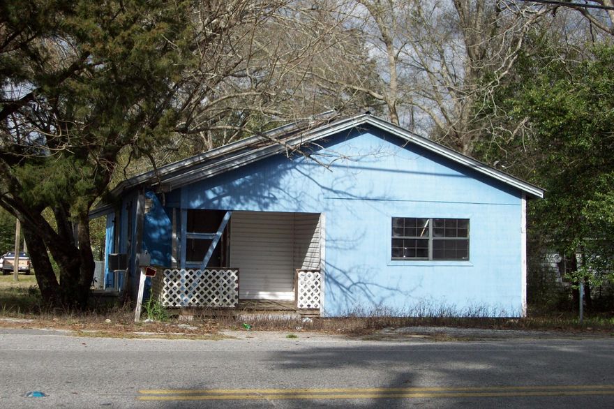 PRICED TO SELL AT LAND VALUE!!! Great investment opportunity. No value given to house, had been a rental for many years and is in need of major repairs. You can clear the lot and build or renovate, choice is yours. Check it out today. Property being sold AS-IS