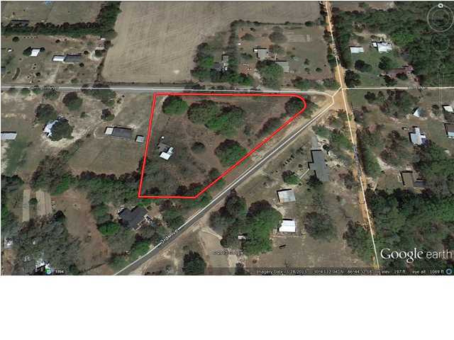 Bank owned property consisting of several lots totaling approximately 2.33 acres. Potential for builder to build several homes on this property. The location is convenient to I-10, Milton and Crestview.
