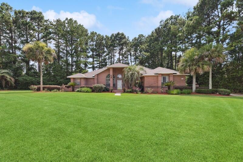 Back on market, no fault of seller! Welcome to your Stonebrook Pool home! Open split-floor plan. Spacious living area with vaulted ceilings, luxury vinyl plank floors, display ledges with dedicated lighting, and a spacious heated and cooled sunroom! You can dine at the breakfast nook overlooking the screen enclosed pool, the kitchen bar, or the formal dining room would be perfect for entertaining! 4th Bedroom with French Doors could be office or playroom. The primary suite has access to the sunroom, its own bathroom with soaker tub, separate shower, dual vanity, powder room, and oversized closet space. Tons of storage/closet space, attic in garage, and more. 2023 Hot Water Heater, 2017 Roof, 2021 Luxury Vinyl Plank in Living Area. All of this in a gated, 24/7 security, golf communit