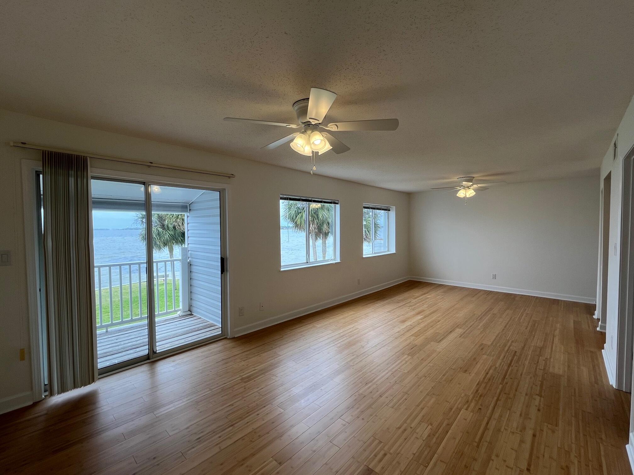 NEW LOWER PRICE for this WATERFRONT unit in Finisterra; RENOVATED from the top to the bottom to include kitchen and bathrooms, flooring, paint and fixtures! This condo in Shalimar is a hidden GEM. The panoramic bay views from this 2 bedroom unit are AMAZING and it could be used as a carefree primary residence or a second home. This unit comes with a designated parking spot in front and Finisterra offers an array of fantastic amenities, including a swimming pool, tennis courts, a convenient laundry facility, gated access, inviting waterfront sitting areas, outdoor grills, and more! The complex is a non-rental community for the first two years of ownership, however, after two years, the owner has the ability to rent long-term but please note that short-term rentals are not permitted.
