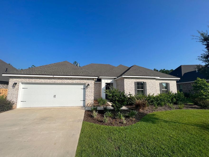 Furniture not included.The CHRISTOPHER III G in The Trails at Hammock Bay community offers a 5 bedroom, 3 full bathroom, open and split design with the master on the lower level and a game room upstairs. Upgrades added (list attached).Special Features: double vanity, garden tub, separate tiled shower, and walk-in closet in master bath, master closet goes through to laundry, boot bench in mud room, double vanity in 2nd bath, walk-in closets in all other bedrooms, kitchen island, walk-in pantry, pocket office, covered rear patio, recessed lights, cabinet hardware, framed mirrors in all baths, smoke/carbon monoxide detectors, landscaping, architectural 30-year shingles, and more!Energy Efficient Features: tankless gas water heater, kitchen appliance package, low E MI windows, and more.