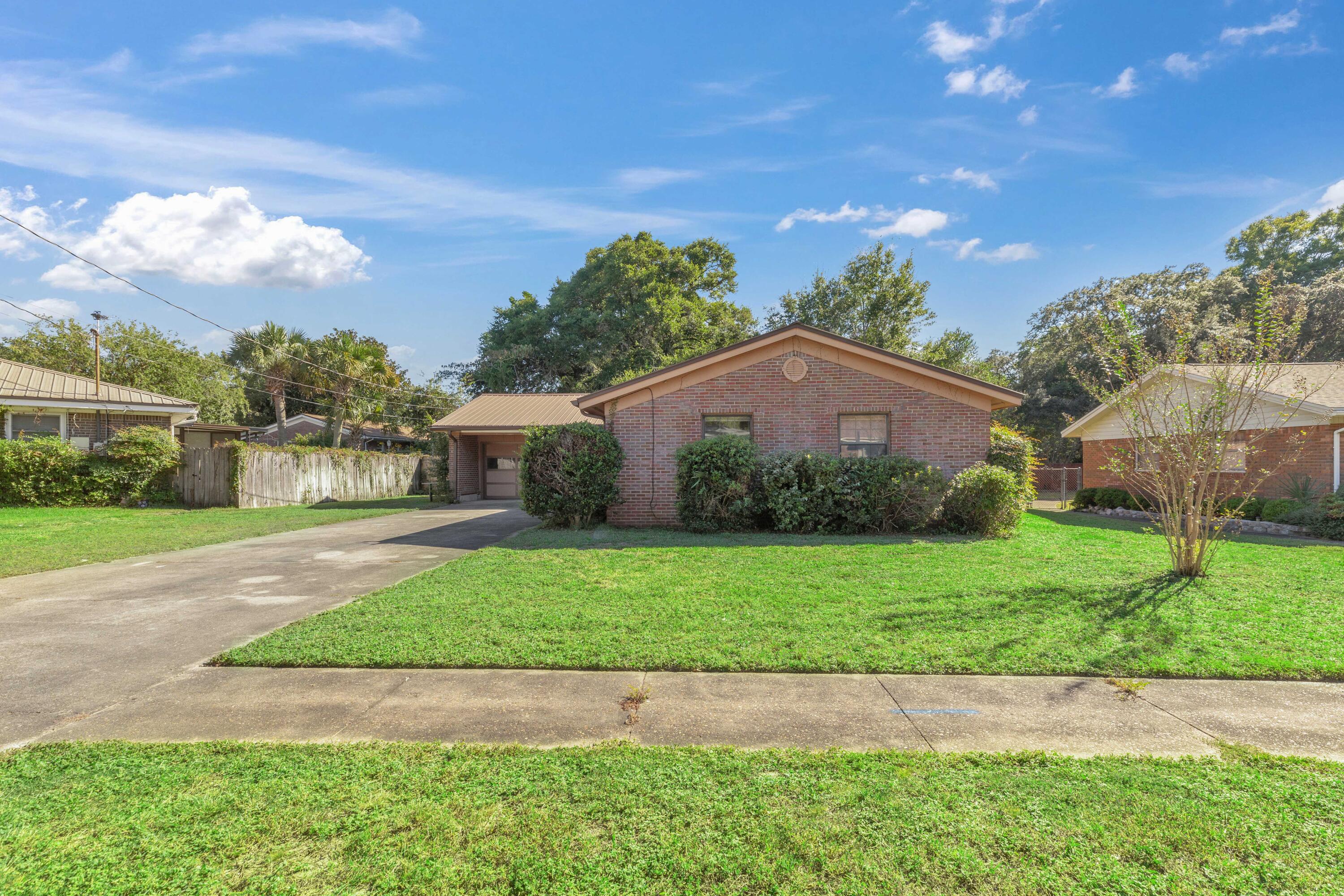 Welcome to this charming single-family residence nestled on a peaceful cul-de-sac. Just blocks away from shopping, dining, schools, and easy commuting, this home offers convenience and comfort. The property features a long driveway with ample parking space, along with a two-car garage. Inside, enjoy the luxury of no carpet throughout, with 3 spacious bedrooms and 2 full bathrooms. The primary suite boasts a master bath with a walk-in shower, while the guest bathroom offers a shower/tub combo. The backyard includes an open patio and a fully fenced yard, perfect for outdoor enjoyment. Pets are welcome with a fee and certain restrictions.