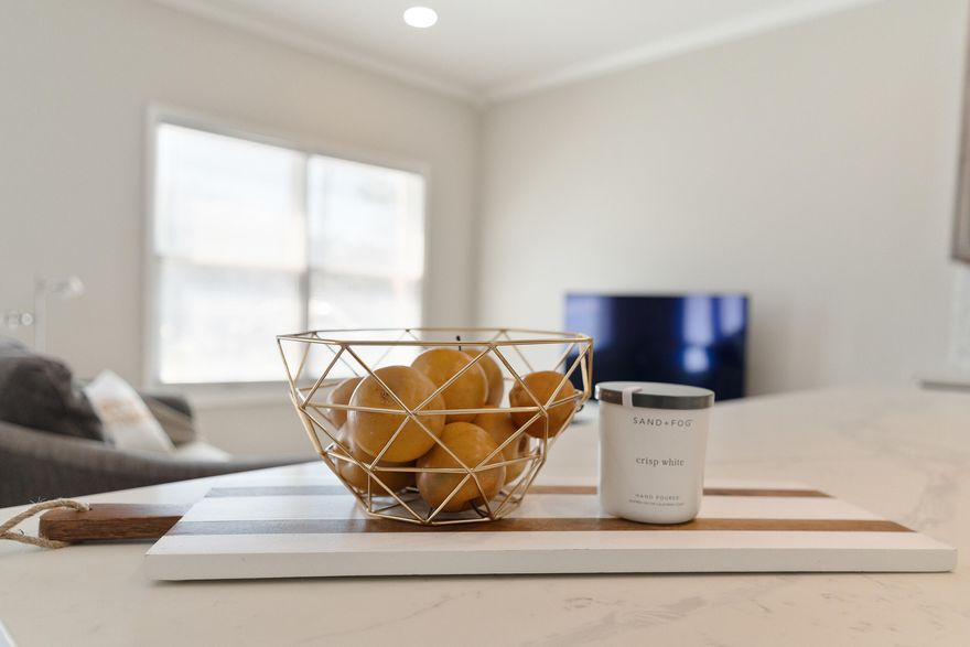 Discover this beautifully updated 2-bedroom, 2.5-bath corner townhome in one of Fort Walton Beach's most desirable waterfront communities. This home is centrally located between Eglin and Hurlburt - Additonally, less than two minutes from schools, grocery stores, and parks. Enjoy a deeded boat slip with lift Swim, fish, or jet ski from the private community dock or shore. Inside features new LVP flooring, custom tile, oversize quartz island, soft-close cabinets, French doors, custom lighting, smart switches, washer & dryer, Ring doorbell, & Garnier's Bayou view from the guest bedroom! Both spacious bedrooms offer en suite baths, including a spa-like owner's suite. Transferable flood insurance. Low HOA. Buyer pays a one-time boat slip transfer fee.