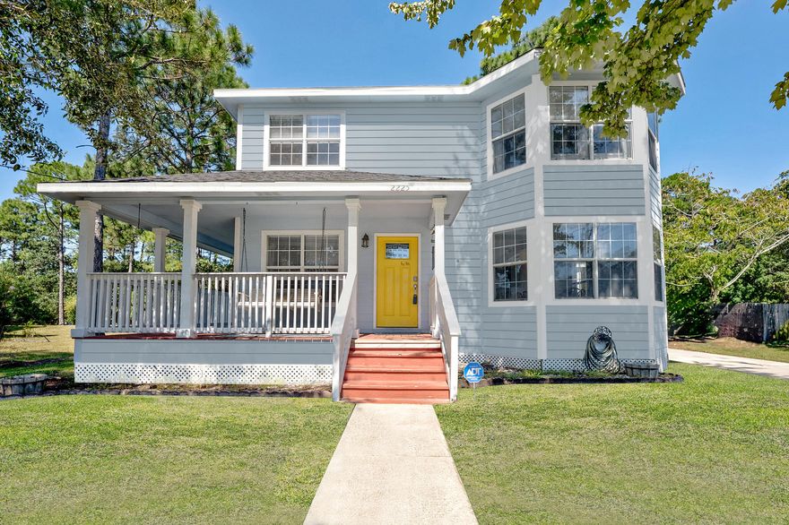 Nestled on a quiet street in Navarre, this 3-bedroom, 2.5-bath home sits on nearly half an acre (0.47 acres). Plus, it backs up to over 80+ acres of greenspace, offering long-term privacy and serene natural views. Previously used as an investment property with over $31k of income. The roof, only 5 years old, offers long-term security and peace of mind. The exterior features a charming wrap-around porch with a glider swing, while the screened back porch opens to a pergola, firepit, and a large shed--perfect for storage or small projects. Inside, enjoy a cozy living space with a fireplace, a formal dining room, and a chef's kitchen complete with new cabinetry, countertops, and a stylish backsplash. The kitchen is equipped with stainless steel Panasonic appliances and a built-in pantry. All t hree bedrooms are located upstairs, each offering tranquil views. The primary suite boasts a bay window seating area, a walk-in closet, and an en-suite bathroom with a quartz double vanity and a tub/shower combo. Conveniently located near shopping, dining, Navarre Beach, and Hurlburt Field, this property balances coastal living with investment potential. Whether you're seeking a peaceful retreat or looking to capitalize on the short-term rental market, this home is a prime opportunity in one of Navarre's most desirable areas!
