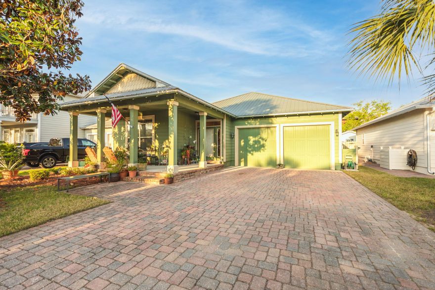 Welcome to Bald Eagle community . Brand New HVAC, Termite bond and 50 year metal roof and 4 point wind mitigation, New Hot water heater, Sprinkler system, Dish washer, Disposal and much more.This home offers curb appeal with paver driveway and large covered front porch. The inviting entry opens to the Large living room and kitchen for those large family gatherings. The kitchen island keeps the conversation going while the chef prepares. The master bedroom suite oasis has space to spare. Tile flooring entry, living room, dining area and kitchen ties this open floor plan together. The two additional bedroom overlooking the rear yard gardens. Enjoy grilling on the rear patio off the living room. The rear fenced yard is perfect for your fur babies.