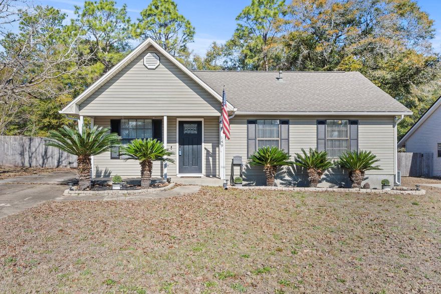 New roof in 2021 and new hot water heater in 2022!  This charming 3 Bedroom, 2 Bathroom one-story home is on a large 0.21 acre lot with an oversized driveway.  This home has it all from an open floor plan and to architectural details of a cathedral ceiling in the living area and an extra-large fenced in backyard perfect for entertaining. The kitchen features a gas stove and oven with matching white appliances that all come with the purchase of this home.  Beautiful wood floors in the main living area and tile flooring in the bedrooms and bathrooms for the convenience of easy cleaning. This home is tucked away within Shoal Terrace Estates which is a prime location in the southeast part of Crestview and is approximately 8 miles to Duke Field Main Gate, 20 miles to Eglin Main Gate, and  approximately 18 miles to Eglin AFB North Gate.  This location is also super convenient to restaurants, shopping centers, and the entertainment in Crestview. There are a lot of new places to visit in Crestview, and this property is right in the center of it all.