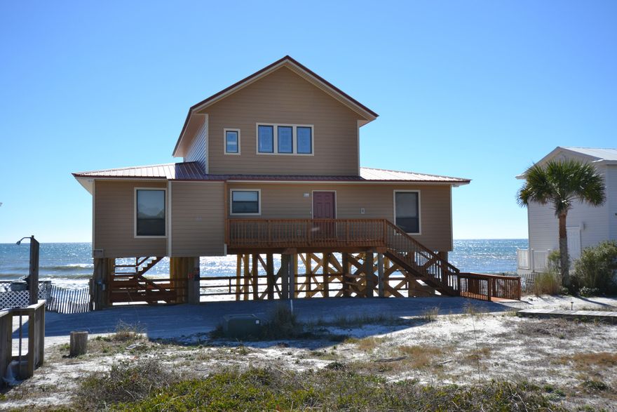 Gulf front home tucked south of 30A on Fort Panic Road with over 600 SF of BEACH FRONT porches! Located on the western, less developed side of 30A where the pace of life is a little slower. 103 Fort Panic has always been a second home, never been rented and is ready for your personal touch! Offered fully furnished in casual beach decor. The first level boasts Gulf of Mexico views from the open living room, dining and kitchen. 2 of the 4 bedrooms also share the same picturesque views! Convenient to the 2 full baths and bedrooms is the laundry closet off the kitchen. The Gulf front loft, just up the spiral staircase encompasses just about everything one would require for a stay at the beach...