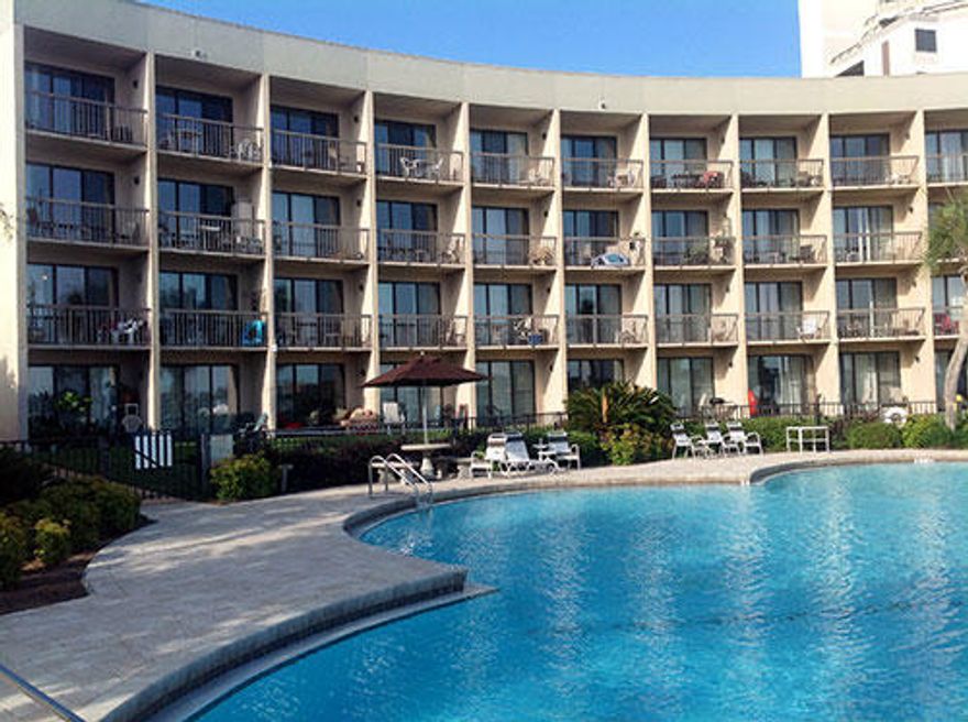 This efficiency unit has been updated to include a Full size stainless fridge and a 4 burner glasstop standard stove. Updated with granite and luxury tile throughout. Great access to the pool on the ground level and extremely well maintained. Perfect for the out-of-towner to have a waterfront unit for the visits to the incredible Emerald Coast and short term rental for vacation spot and investment. Unit has a negotiable 25' boat slip (Separate Purchase)also. Call to view it today!