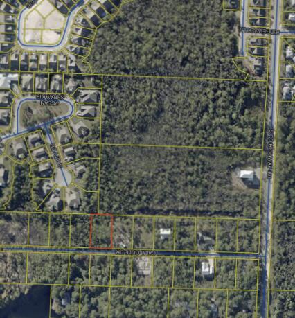 Build your dream home on this private road located about a mile from the beach access, dining & shopping at Gulf Place. It's hard to find 1/3 acre lots south of 98 completely buildable and in a NO FLOOD ZONE. An environmental study has been completed showing 0.18 of uplands to build on from front setback to mid prop line. Mitigation is required from the DEP. It sounds more intimidating than it really is, but the approval process takes about 2-3 months, and there are several companies that run the application for you. Filled with beautiful native plants, backs up to a preserve for that added privacy. The Timpoochee/Longleaf Trail is a short distance away, which provides trail-goers scenic views of marsh lakes, sandy dunes, and coastal neighborhoods. Survey and wetland study is available