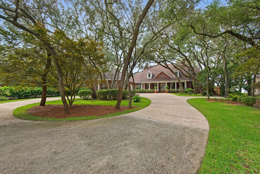 The incomparable setting for this elegant estate will surprise and delight you.  With an expansive southern view of Choctawhatchee Bay with Destin shoreline to the East, Okaloosa Island dunes to the South and Fort Walton Beach bayous to the West you will always have something beautiful to enjoy. On an acre lot that sits over 25 feet above the bay, your mind will be at ease as you live among graceful live oaks and coastal breezes.  Property like this is both rare and rarely available for sale. Make an appointment today to experience this exceptional place and secure your new home on the exquisite, sparkling waters of the gulf coast.