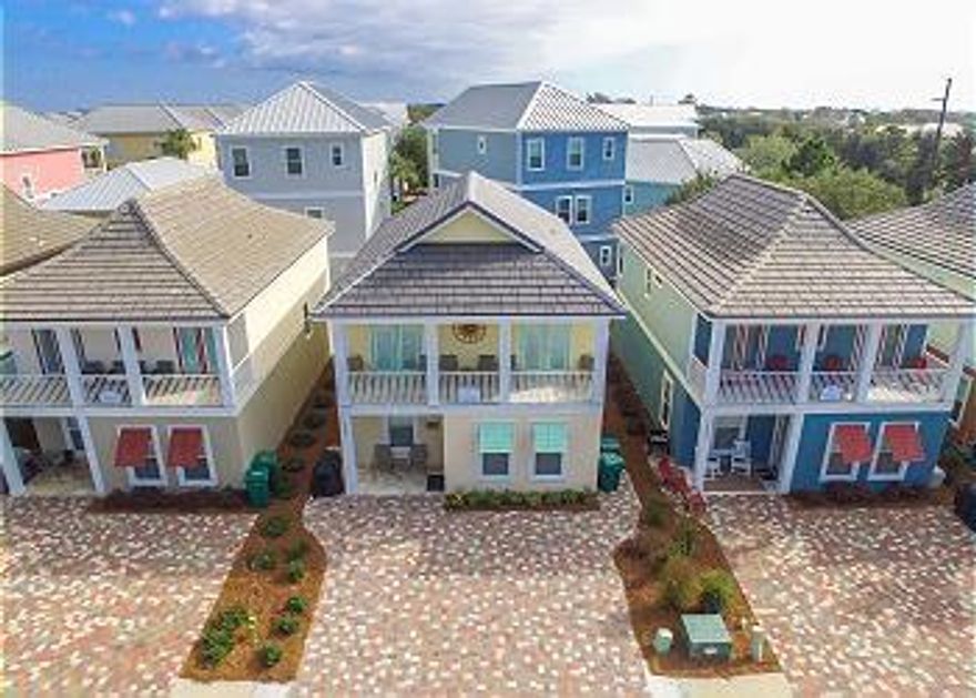 LOCATION LOCATION LOCATION!!! This awesome Investment opportunity is waiting for you!  Rental income is proven at almost $80K gross and can do over $90K with less owner use. Beach is a short 3 blocks, shopping and dining within one block and numerous golf courses 1-5 miles. Village of Crystal Beach Boasts one of the most beautiful lagoon style pools with 30,000 square feet of sparkling water around with lush landscaped island, 3 waterfalls, surround sound music and spa.  Need a break from the sun relax under the shade of the  Tiki Bar with loads of space to relax and entertain. This community is a top earner with even higher projections for 2022. Projections nearing $100K gross rental. 4 Bedroom 3.5 bath with 2 living areas, 2 master suites and custom bunks for super kid fun.