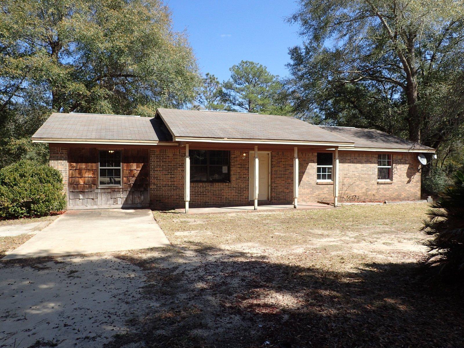 This Fannie Mae Homepath REO property is minutes from the City of Crestview but far enough to feel country. Home was built in 1979 and has all brick exterior, dimensional shingles, and the garage was previously converted to living space. This converted space is now a 4th bedroom. Home has an additional 3 bedrooms and modified bath. Sitting on just an acre, this home has tons of potential. Call today!