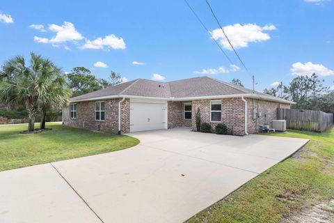 Photo of 1827 Sundown Dr Dr, Navarre, FL 32566 (MLS # 991488)