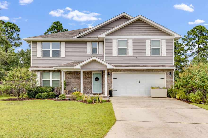 BETTER THAN NEW! This home has all of the custom updates you never knew you wanted! Built-in bench and shelving in the office, built-in electric fireplace in the living room, PLUS a full-size built-in Murphy bed in the flex space! This house has all of the little touches that make it feel like home.  With all 4 spacious bedrooms upstairs and a custom designed laundry room- everything is made to make your life easier! The open kitchen, living, and dining rooms make sure you never miss a beat, and the backyard is your own private retreat! Enjoy your evening relaxing by the custom built fire-pit overlooking the nature that abounds in the back half of your property. Located in South Crestview, this home is just minutes from schools, shopping, and local military bases! Schedule your showing!