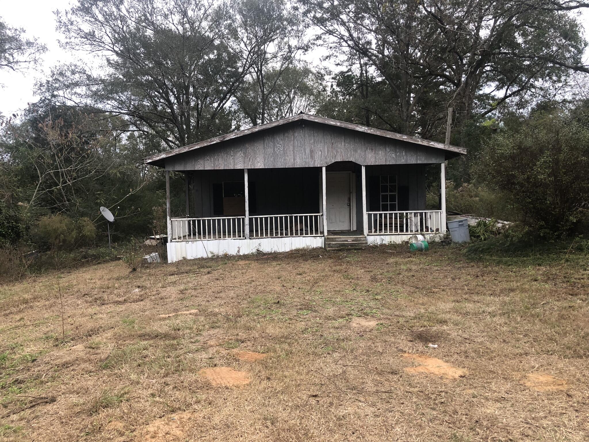 Country fixer upper located 1.5 miles from Red Level High School. This one needs a lot of love and cleaning up for sure, but could be really cute! Investment potential as it was a rental property in the past. Yard was mowed recently and new photos have been uploaded of the interior and exterior.